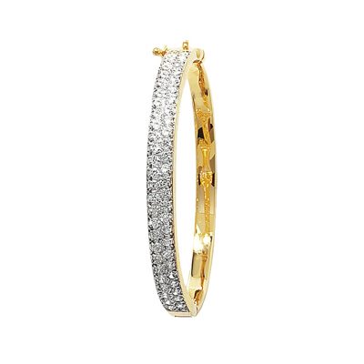 9k yellow gold tripple row stone set kids bangle. The bangle is solid with cubic zirconia stones.