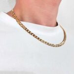 9k Yellow gold solid curb chain for men with bevelled edges 5.5 mm wide avaiable in 20, 22 and 24 inches.