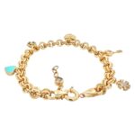 14k yellow gold stone set charm bracelet with snow flake, key heart, heart, clover and heart enamel color. Ladies and womens bracelet in 7.5 inches.