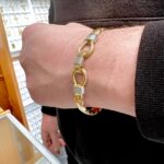 9k Yellow Gold Double Hook Bangle, in 13 mm Plain in solid gold, heavy weight. The Bangle is fully hallmarked and sent out securely in a gift box.