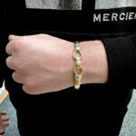9k Yellow Gold Double Hook Bangle, in 13 mm Plain in solid gold, heavy weight. The Bangle is fully hallmarked and sent out securely in a gift box.