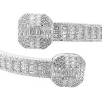 925 sterling silver cross over bangle bracelet with rectangular shaped and round shaped cubic zirconia stones.
