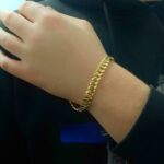 Solid and thick Cuban Bracelets in 9k Yellow Gold, with a 3-step safety Box clasp. The bracelet is handmade 9 mm wide and available in 7 lengths. The bracelet can be ordered in any length by inquiry trough phone or email. The bracelet is UK Hallmarked for authenticity purposes and will be safely shipped out in a gift box as all of our jewellery.