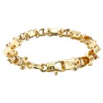 9k Yellow gold solid lego bracelet in 8 mm wide.
