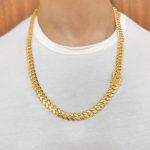 10 mm wide Miami Cuban chain on a man for men with a safety box clasp heavy weight.