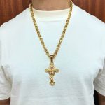 9k yellow gold solid gypsy link chain and crucifix pendant.