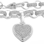 Heart charm belcher bracelet in 925 sterling silver for women 9 mm wide with cubic zirconia stones.