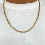 9k yellow gold solid tulip chain 5.5 mm wide 20 inches long.