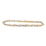 14k (585) Yellow, White and Rose Gold Diamond Cut Patterned Ball/Bead bracelet in 6 mm width. The balls graduate from smaller to bigger size and meet in the middle. This bracelet has a secure clasp where the sizes are adjustable from 6.5 to 7.5 inches. The bracelet is UK hallmarked and shipped out securely in a secure gift