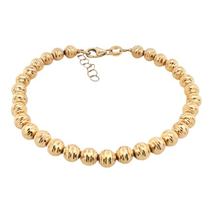 14k Yellow Gold diamond cut ball bead bracelet for ladies with adjustable size 6.5 to 7.5 inches 5 mm wide.
