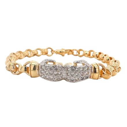 9k yellow gold solid belcher bracelet with stones on the gloves. kids size small size