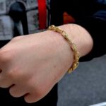 Solid Patterned Tulip Bracelets in 9k Yellow Gold, 7.5 mm wide, for suitable for men, women and children. Every link is intricately patterned and assembled with a shiny finish. The link is fully hallmarked in a local assay office, solid UK made, with exceptional finish.