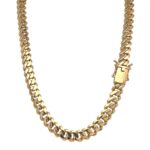 8 mm wide cuban chain for men in 9k yellow gold solid tight and thick links Miami style.