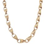 9k yellow gold solid tulip chain for men women and children. The chain is 7 mm wide and available in 18, 20, 22 and 24 inches.