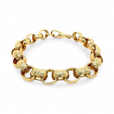 9k Yellow gold solid belcher bracelet in 11 mm widht with patterned and plain links UK made.