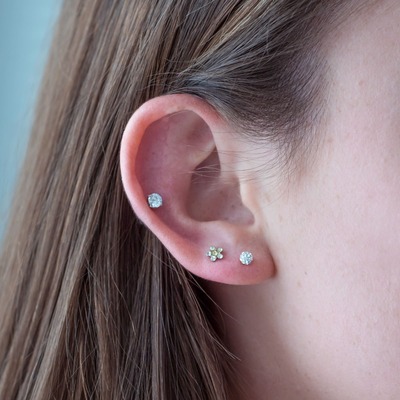Kid with ear piercing from Top Jewellery