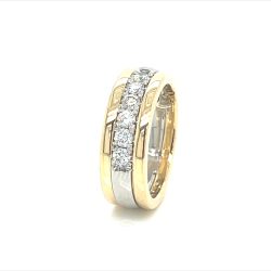 Platinum Band in middle sandwhiched byt 2 18k rings on each side, Claw set with VS1 Diamonds.